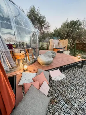 a gazebo with pillows and a table and a room at The Vino Dome By Once Upon a Dome Franschhoek in Franschhoek