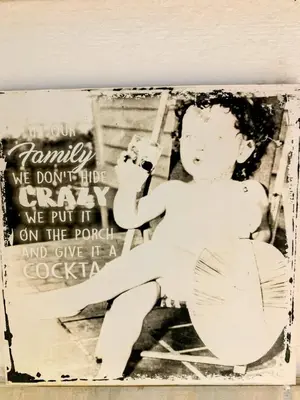 a black and white picture of a girl holding a gun at Regent Casa's - Cape Towns Blouberg Area - Where 20 people can stay in Cape Town