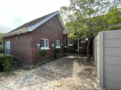 a brick house with a driveway in front of it at Somerset West All Stay 2 in Somerset West