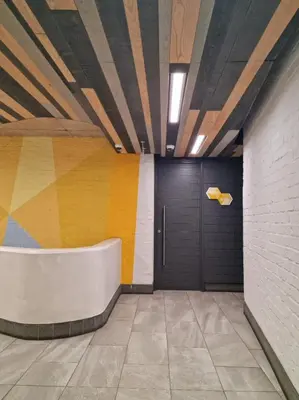 a hallway with a door and a wall at Matrix by Smart City Stays in Cape Town
