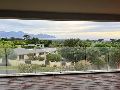a view from a window of a house at Amazing! 7 bedroom villa with rooftop pool & views in Cape Town