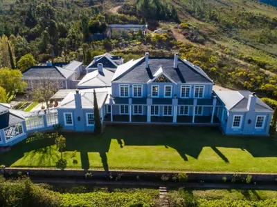 an aerial view of a large house with a horse on the lawn at Faraway Estate in Villiersdorp