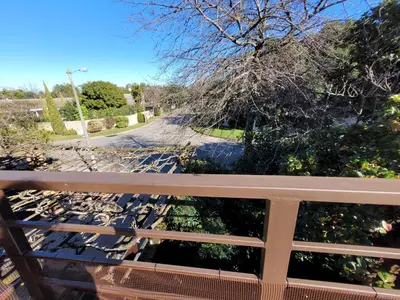 a view of a street from a balcony at Elegantie Apartment Protea 5 Lovell Avenue in Stellenbosch