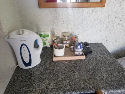 a kitchen counter with a toaster and other items on it at 9 on Oostersee in Cape Town