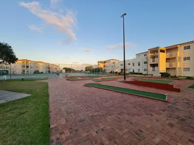 a brick courtyard in a city with buildings at Hermanus Beach Club UNIT 74 in Hermanus