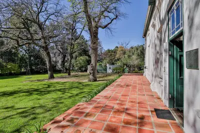 a brick walkway in front of a building at Twistniet BnB in Wellington