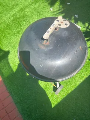 a black object sitting on the grass at The Great escape 5 mins away from Blouberg Beach in Cape Town