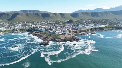 an aerial view of an island in the ocean at The W-Collection Esplanade Hermanus in Hermanus