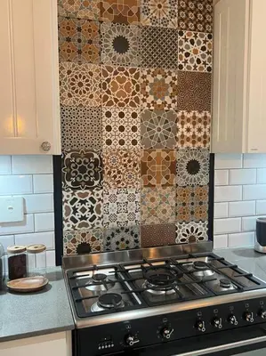 a kitchen with a stove and a wall with tiles at 7de Hemel Paarl in Paarl
