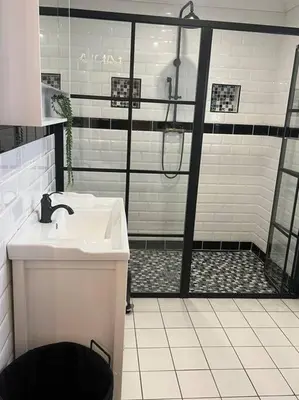 a bathroom with a shower with a sink and a toilet at 7de Hemel Paarl in Paarl