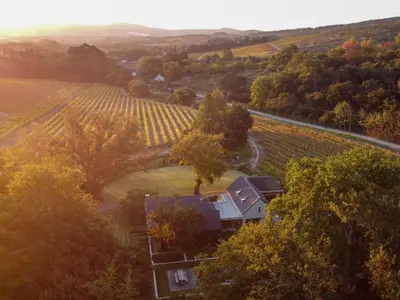 an aerial view of a house in a vineyard at Farm Keerweer in Stellenbosch