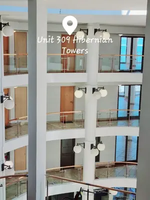 a view of a building with the words unit percent international towers at Beachfront Luxury Apartment - Hibernian Towers 309 Strand - Self Catering in Cape Town