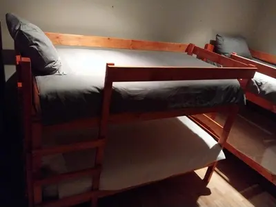 a couple of bunk beds in a room at Serenity Shores Backpackers in Cape Town