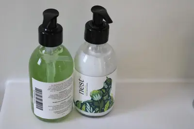 two bottles of detergent sitting next to each other at Digital Nomad's Nest, Somerset West in Cape Town