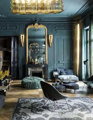 a living room with a fireplace and a mirror at Die Heerenhuys Guest Suites in Stellenbosch
