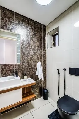 a bathroom with a toilet and a sink at Belina - Crystal Towers Presidential Penthouse in Cape Town