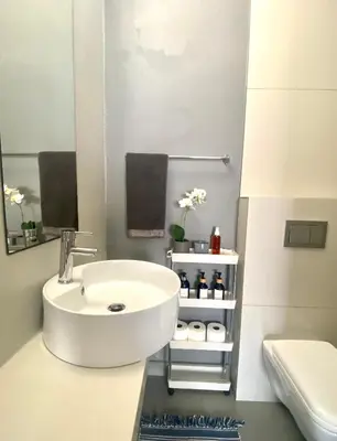 a white bathroom with a sink and a toilet at Stay on Main 1 in Paarl