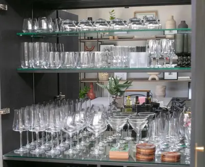 a bunch of glasses on a shelf in a store at House of Anjel in Suider-Paarl