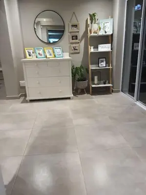 a room with a white dresser and a mirror at Calmness in Claremont in Cape Town
