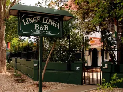 a sign for aunglie luana bbb in front of a house at Linge Longa in Worcester