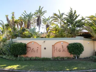 a house with the word hate written on it at Dai Heka Guest House in Strand