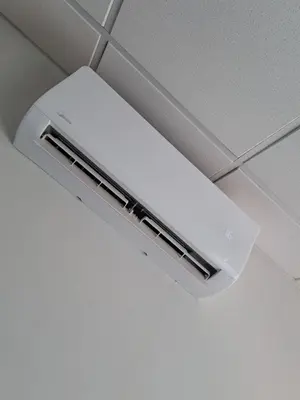 a white light hanging from a ceiling at The Stetson - Paarl - Self Catering Apartment in Paarl