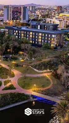 a view of a building with the star buys stays logo at 9 Palms by Smart City Stays in Cape Town