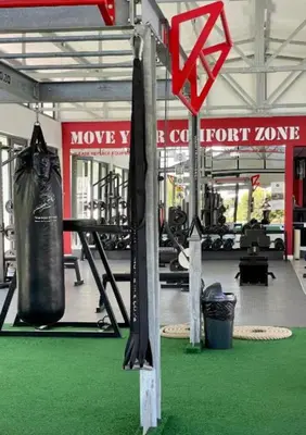 a gym with a punching bag and a fight zone at The Sandown Blouberg self catering unit in Parklands