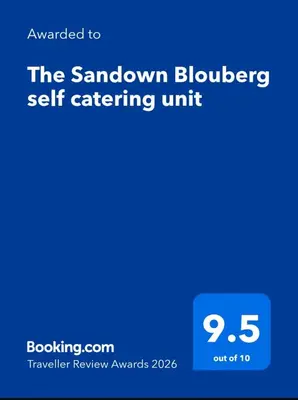 a screenshot of the sanctuary bluer self catering unit at The Sandown Blouberg self catering unit in Parklands