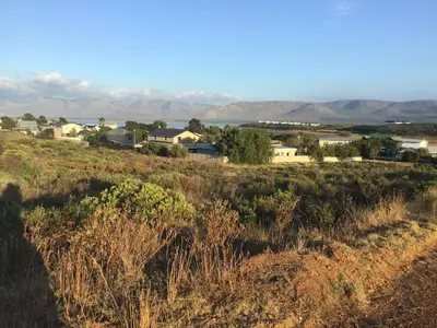 a view of a small town from a field at Watercolour Cottage in Hermanus