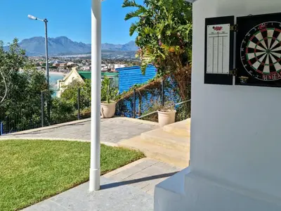 a dart board on the side of a building at 'BoStrand' - Private and Central, only 2 min walk to beach - sleeps 2 in Gordonʼs Bay