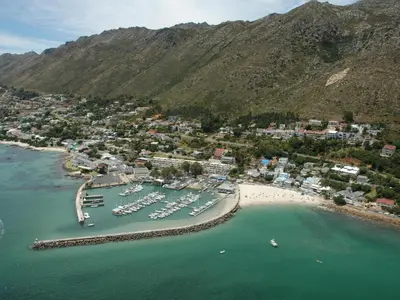 an aerial view of a harbor with boats in the water at 'Ocean Views', Modern, Spacious Home, 3 En-suite Bedrooms in Cape Town