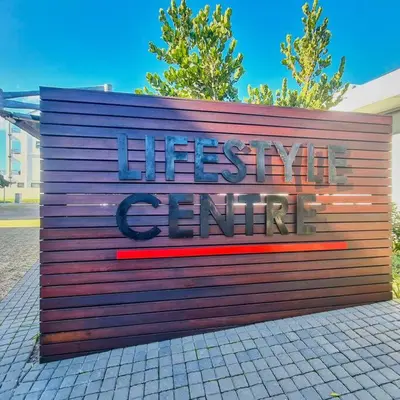 a sign that says hissy center on a wall at 1d - Serene Retreat of Parklands in Cape Town