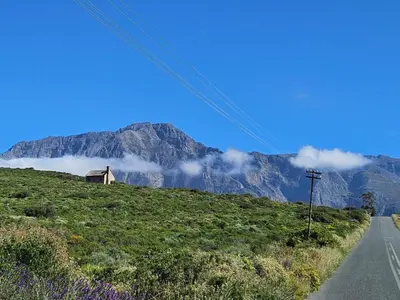 a house on the side of a hill with a mountain at At 37 Masters Way in Brandwacht