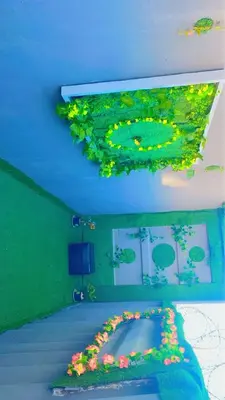 a bedroom with a bed with flowers on the ceiling at Kwaaamiii in Cape Town