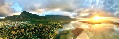 an aerial view of a city and a mountain at Fantastic spot In Hermanus with great lagoon views in Hermanus