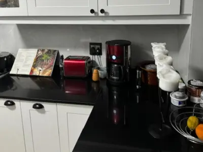 a kitchen counter top with a coffee maker on it at Bordeaux 45 in Cape Town