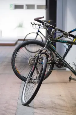 a bike parked on the floor in a room at WINK Aparthotel Quiver Tree in Stellenbosch