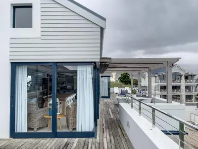 a house on the deck of a boat at Le Paradis Penthouse in Hermanus