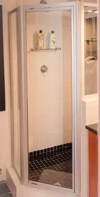 a shower with a glass door in a bathroom at Apartment in central Stellenbosch in Stellenbosch