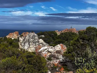 a group of rocks with a cross on top of it at Picollo Bocca Villa Kleinmond in Kleinmond