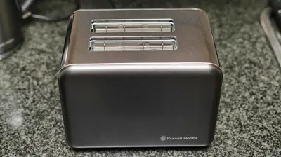 a close up of a toaster on a counter at Royal Beauty in Paarl
