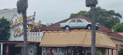 a car is sitting on top of a building at Matt's Place in Cape Town