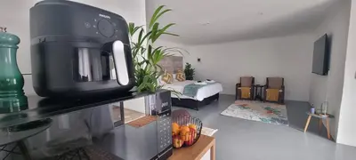a kitchen with a coffee maker on a counter at Matt's Place in Cape Town