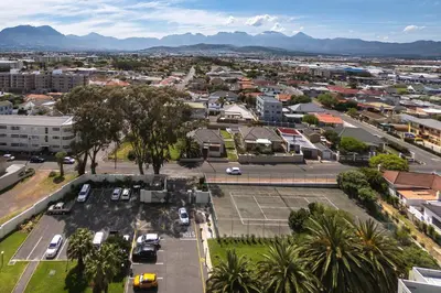 an aerial view of a city with a tennis court at Elegance on Beach in Cape Town