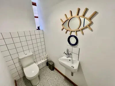 a bathroom with a toilet and a sink at 2 Bedroom Apartment On Dorp St - Prime Location in Stellenbosch
