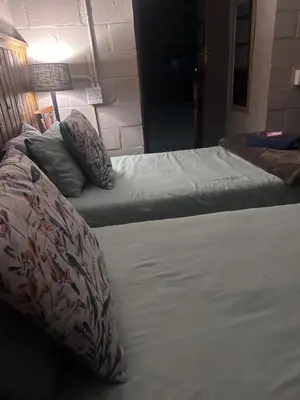 two beds with pillows sitting next to each other at The Jack at Marnas Self Catering Accommodation in Cape Town
