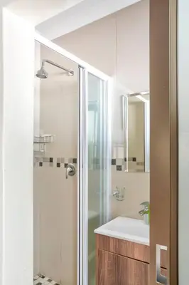 a bathroom with a shower and a sink at Goodwood Oasis FreeWiFi-Parking 1 in Cape Town