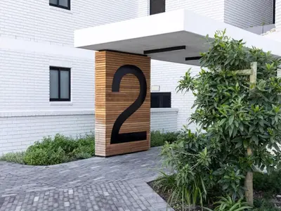 a building with a number on the side of it at Nine Palms 223B in Cape Town