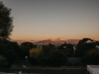 a view of the sunset from a street at Cape Select Luxury Accommodation in Durbanville
